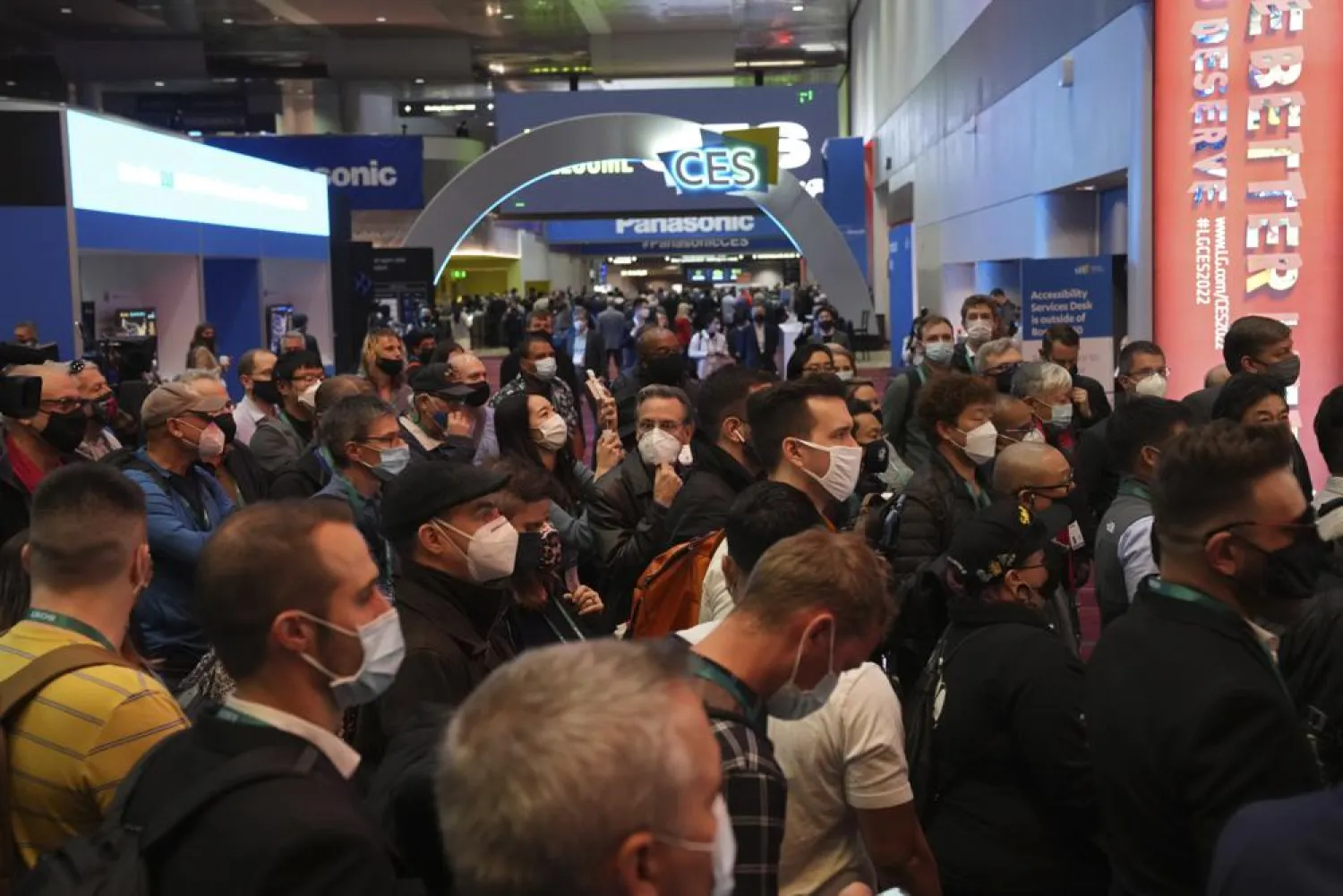 A crowd waits to enter the main show floor at the CES tech show Wednesday, Jan. 5, 2022, in Las Vegas. (AP Photo/Joe Buglewicz)
