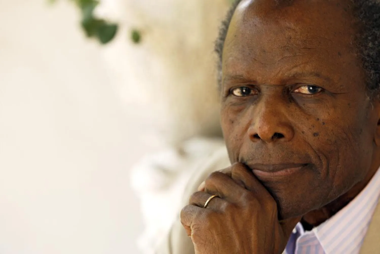 FILE - Actor Sidney Poitier poses for a portrait in Beverly Hills, Calif. on June 2, 2008. (AP Photo/Matt Sayles, File)