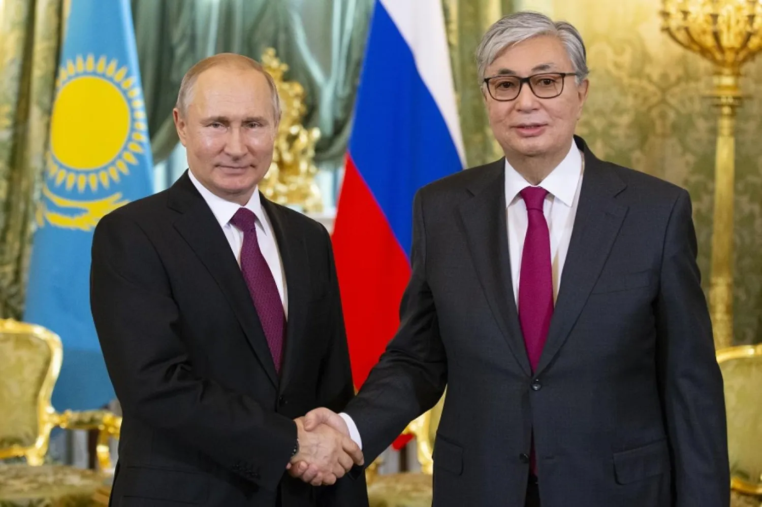 Rusya Devlet Başkanı Vladimir Putin ve Kazak mevkidaşı Kasım Cömert Tokayev. (AFP) 
