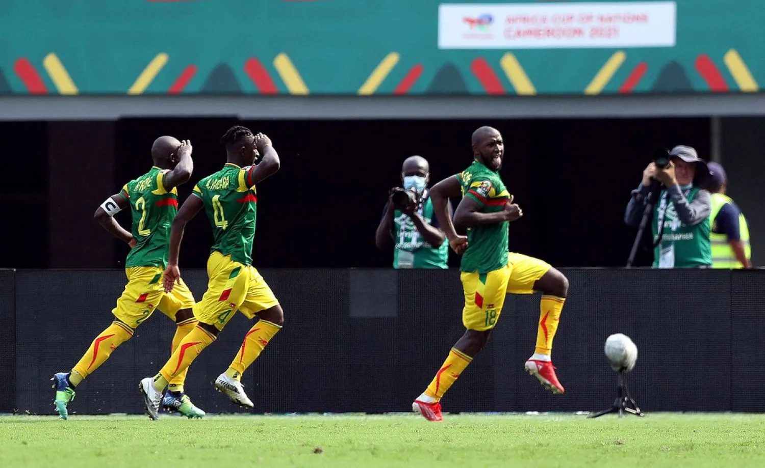 Ibrahima Kone celebrates scoring their first goal with Hamari Traore and Amadou Haidara. (Reuters)