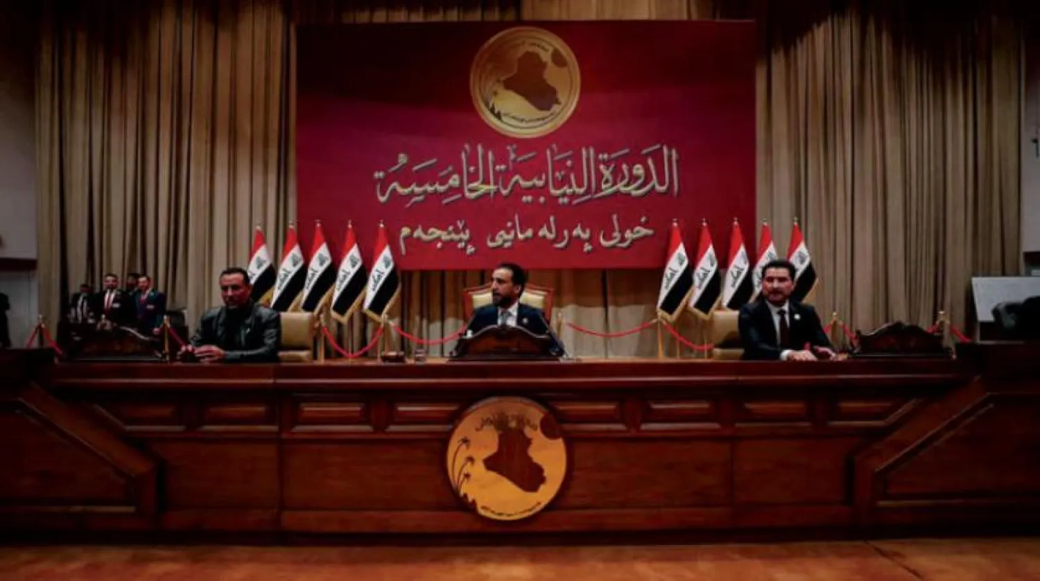 Parliament Speaker Mohammed al-Halbousi (C) after his reelection to his post on Sunday. (Reuters)