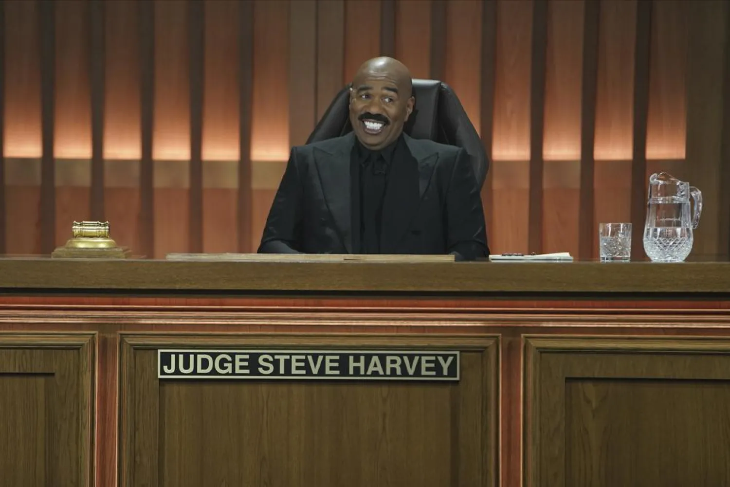 This image released by ABC shows Steve Harvey from "Judge Steve Harvey" in an episode entitled "Stuck on Stupid" airing Tuesday, Jan. 11 on ABC. (ABC via AP)