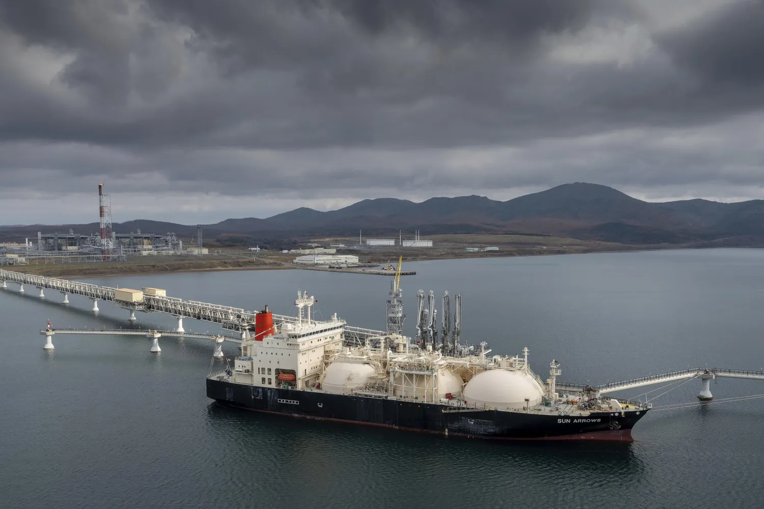FILE - The tanker Sun Arrows loads its cargo of liquefied natural gas from the Sakhalin-2 project in the port of Prigorodnoye, Russia, on Friday, Oct. 29, 2021. (AP Photo, File)
