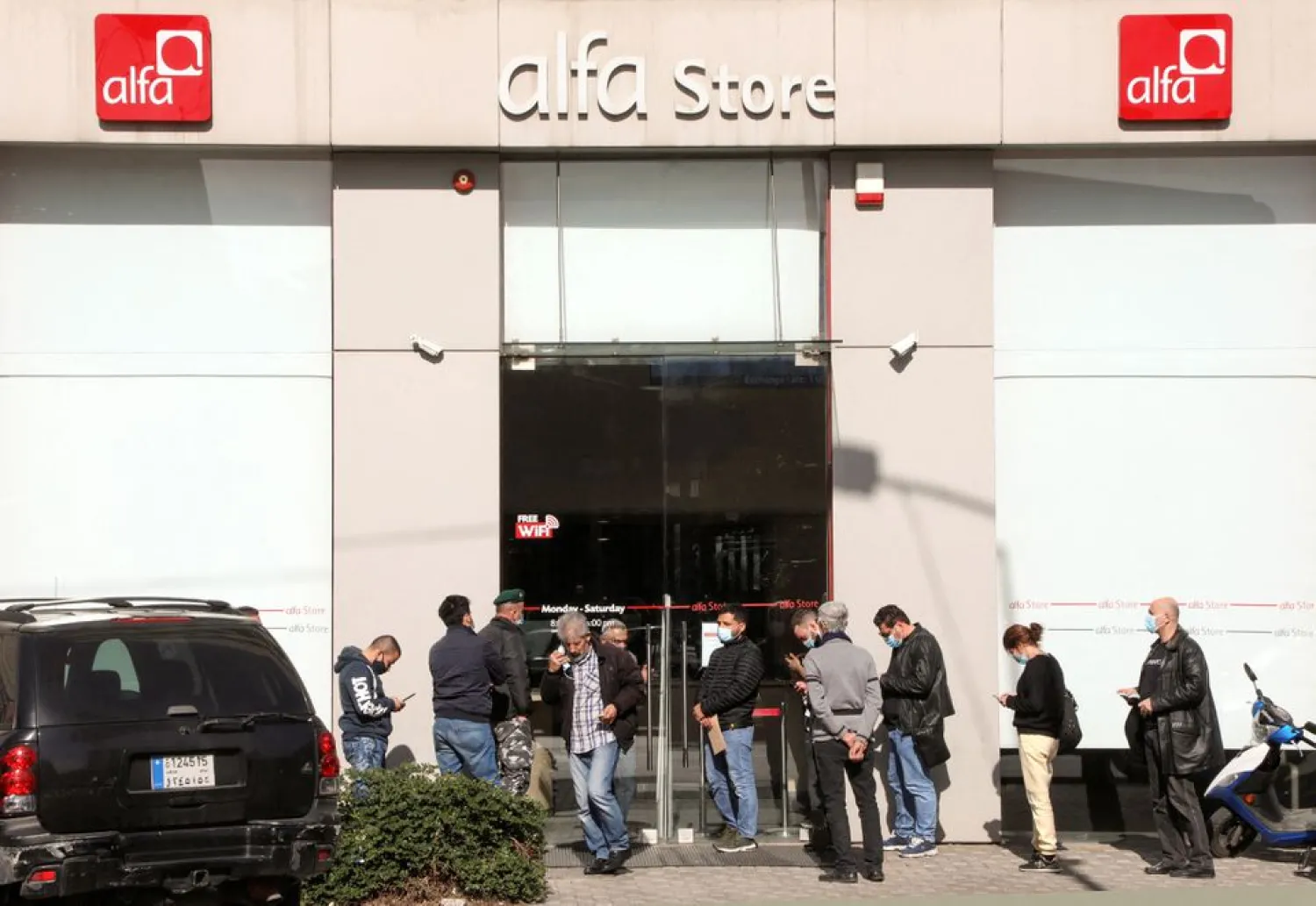 People queue outside an Alfa telecommunications store in Beirut, Lebanon January 12, 2022. REUTERS/Mohamed Azakir