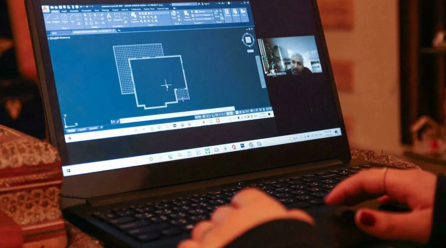 A university student takes a course via remote learning at home in Beirut, but staying connected during state power cuts that can last more than 20 hours a day comes with a financial cost ANWAR AMRO AFP
