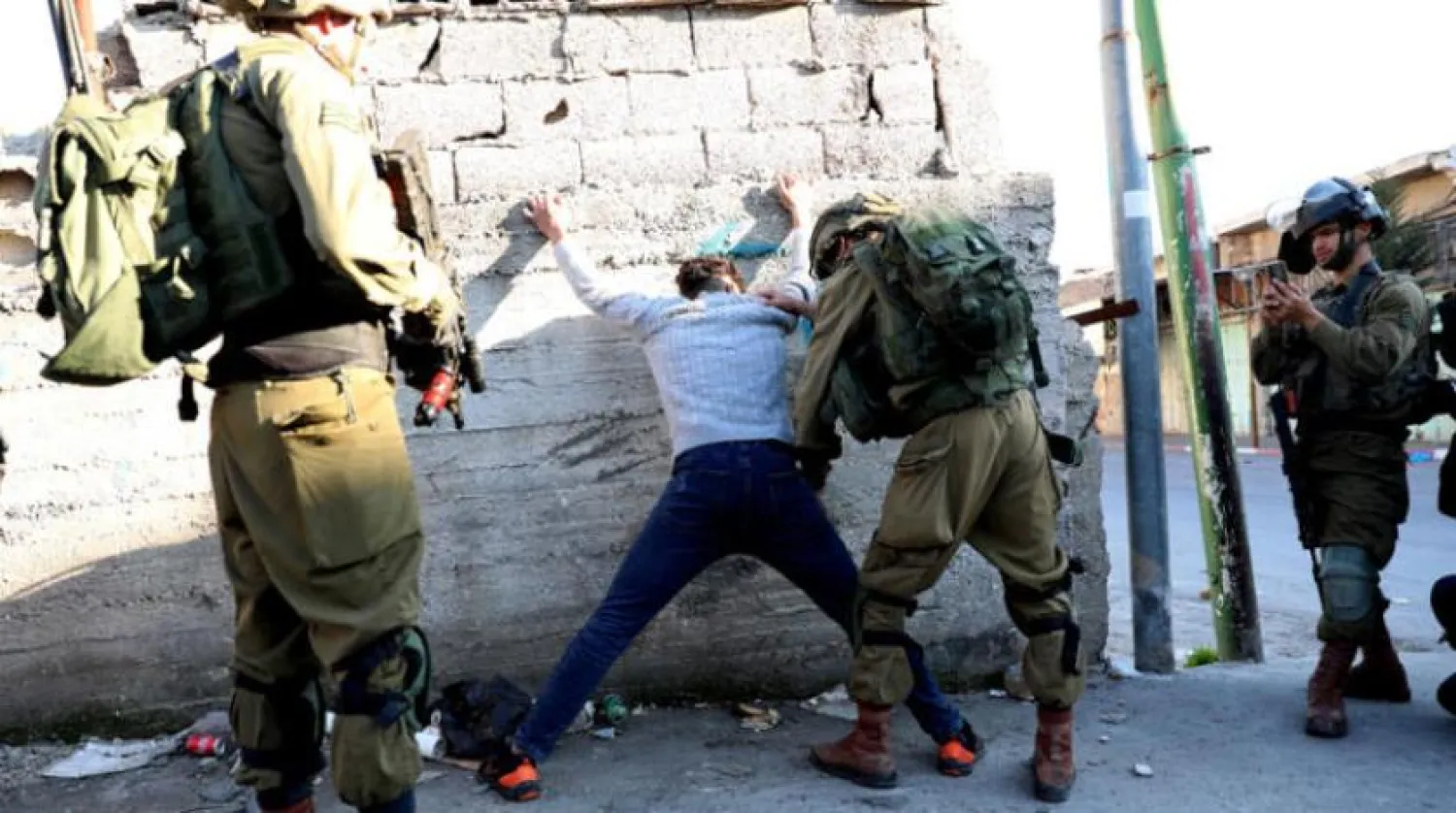 The Israeli army arrested a Palestinian near the Cave of the Patriarchs last Friday during Palestinian protests against the presence of settlers (EPA)