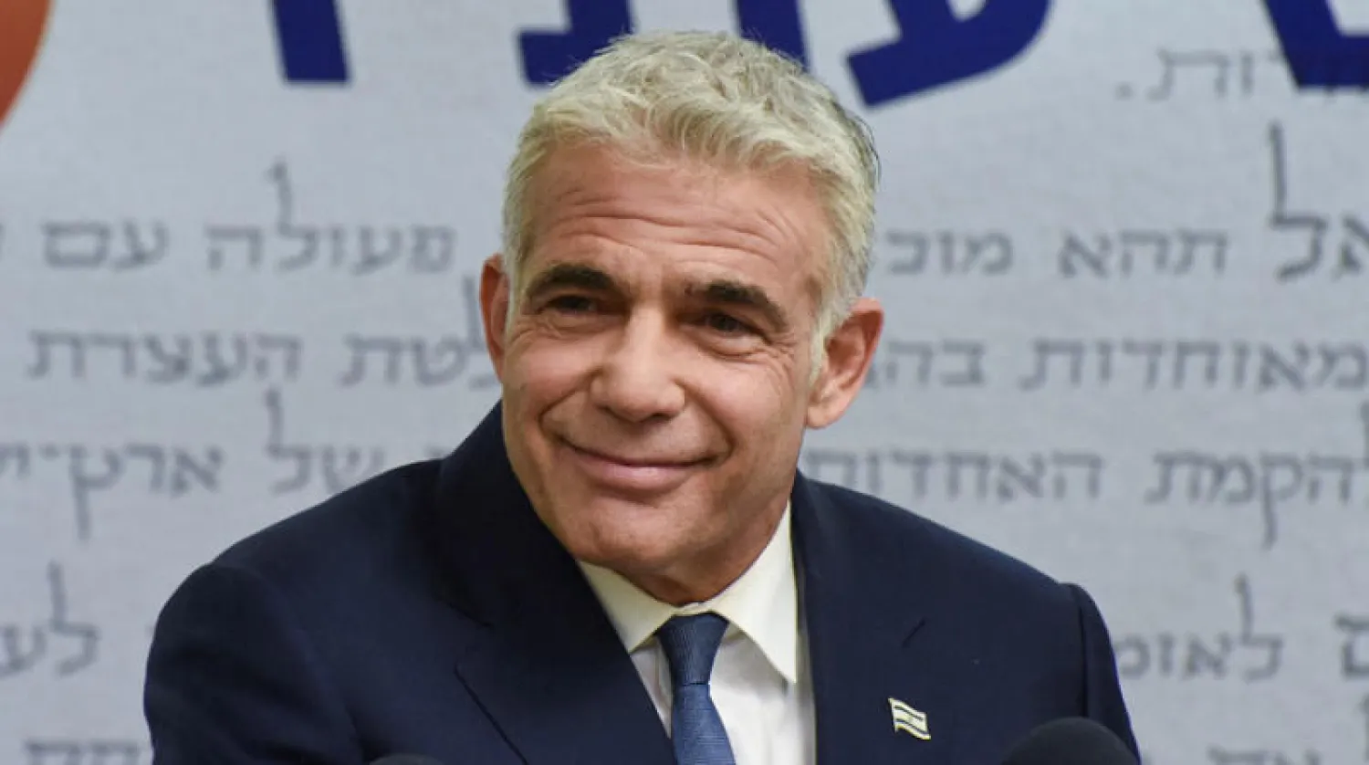 وزير الخارجية الاسرائيلي يائير لبيد (رويترز)