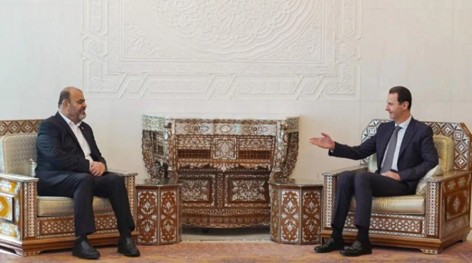 Suriye Devlet Başkanı Beşşar Esed ile İran Yollar ve Şehirler İnşaat Bakanı Rüstem Kasemi (SANA)