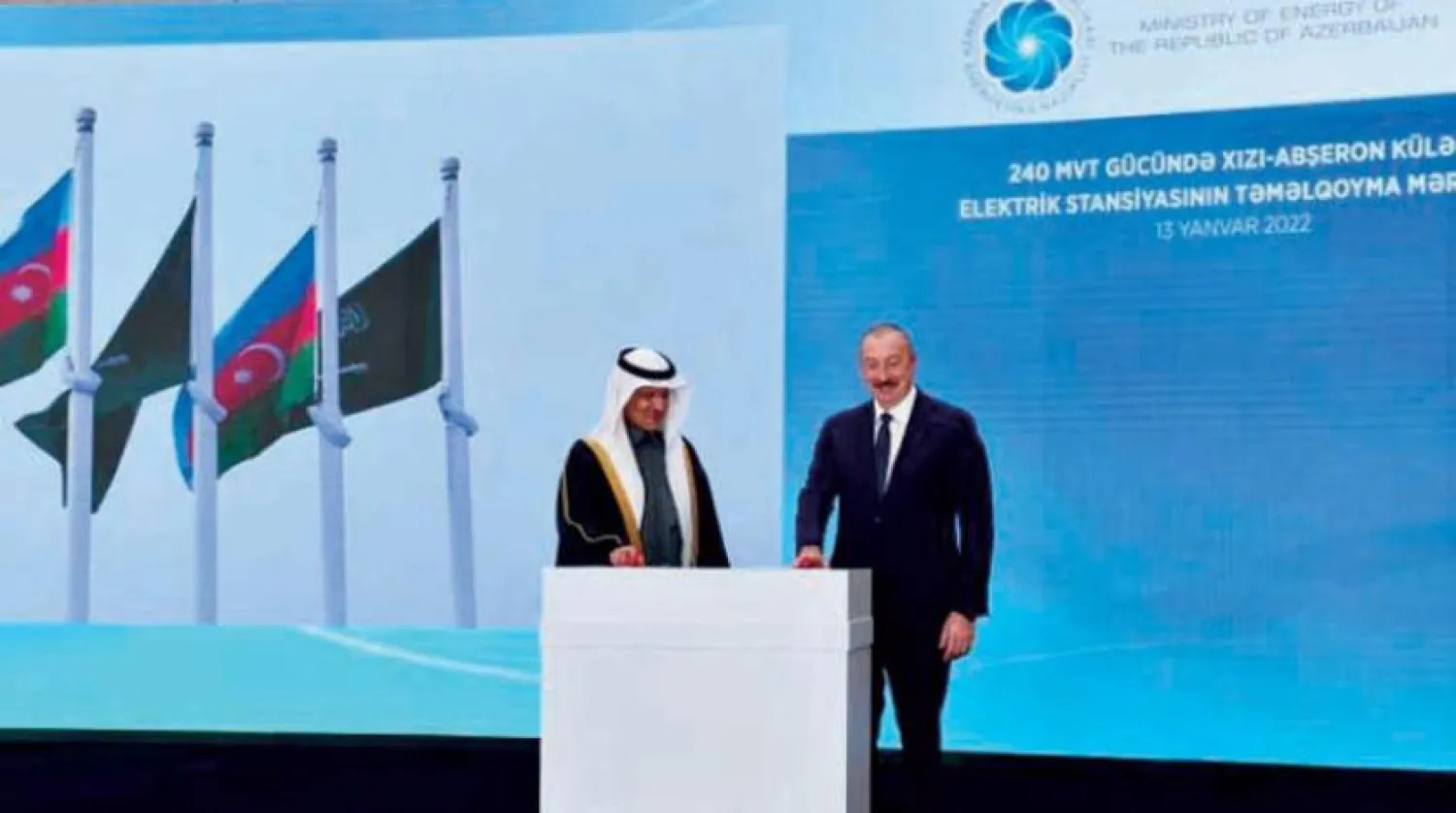 Saudi Energy Minister Prince Abdulaziz bin Salman and Azerbaijan’s President Aliyev after laying of the foundation stone for a wind power plant on Jan.13, 2022. (Asharq Al-Awsat) 

 