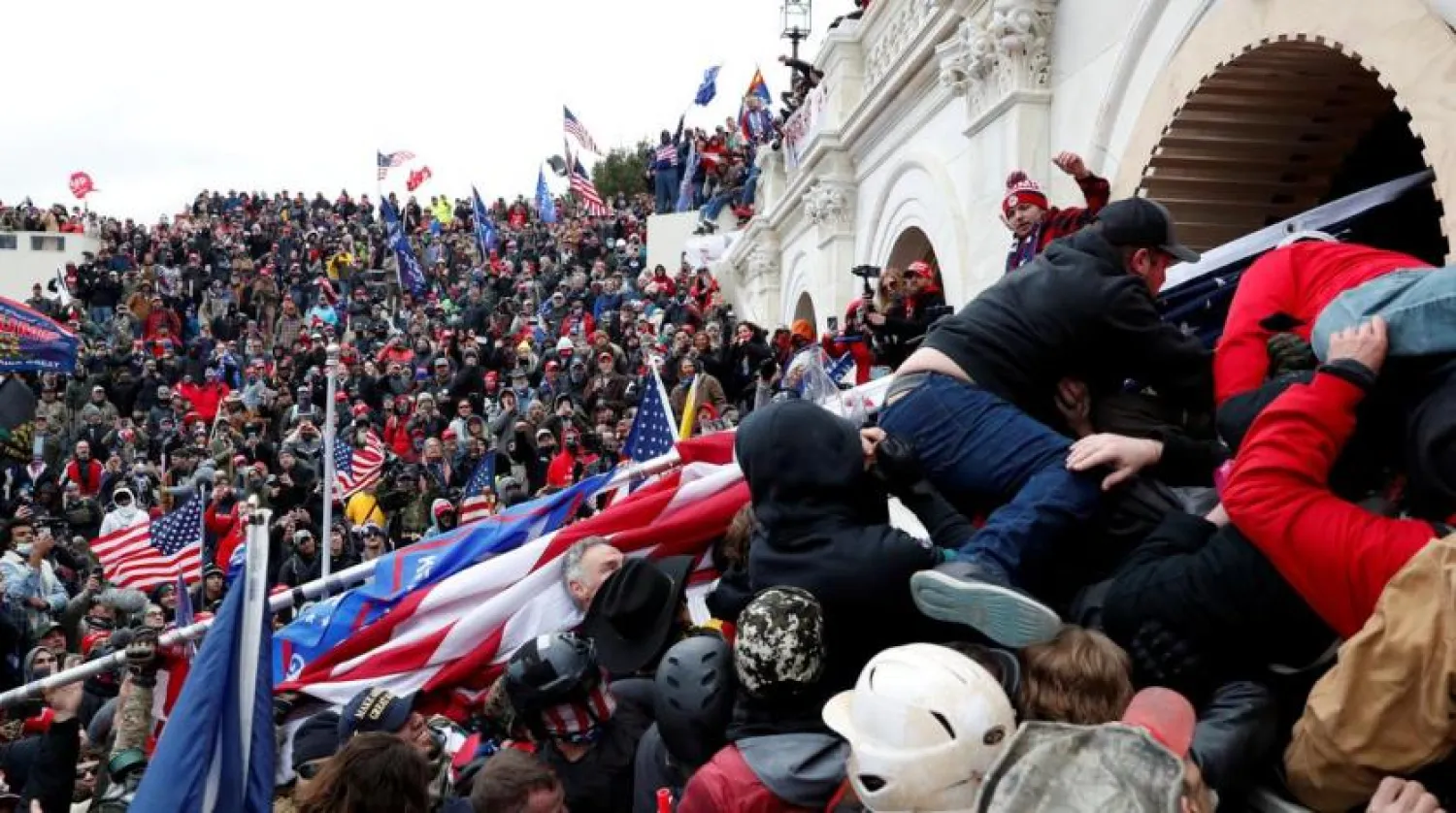 Pro-Trump protesters storm into the US Capitol during clashes with police, during a rally to contest the certification of the 2020 US presidential election results by the US Congress, in Washington, US, January 6, 2021. REUTERS/Shannon Stapleton
