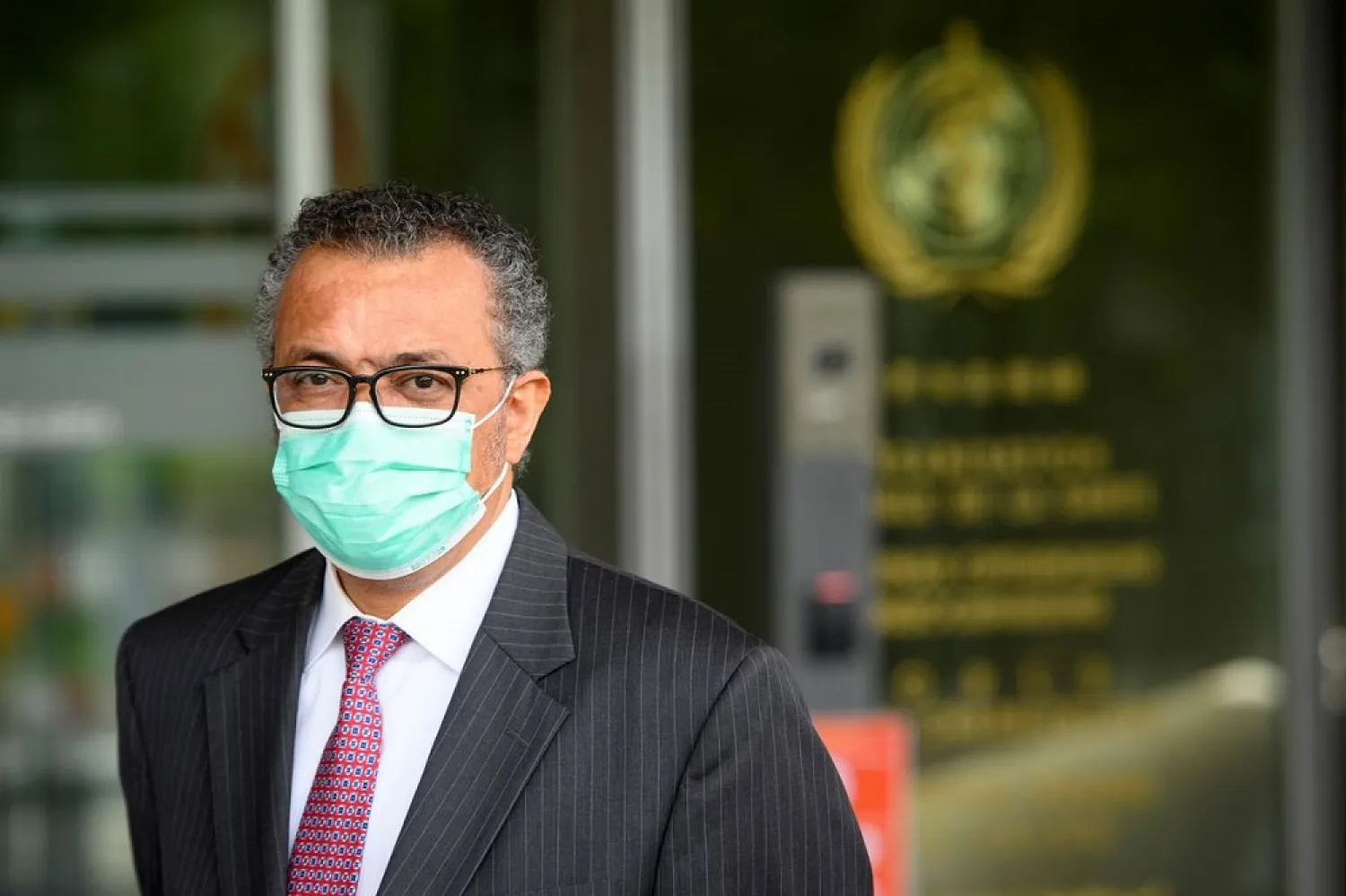 World Health Organization (WHO) Director General Tedros Adhanom Ghebreyesus waits for the arrival of Swiss Interior and Health Minister Alain Berset before a bilateral meeting on the sidelines of the opening of the 74th World Health Assembly at the WHO headquarters, in Geneva, Switzerland May 24, 2021. (Reuters)