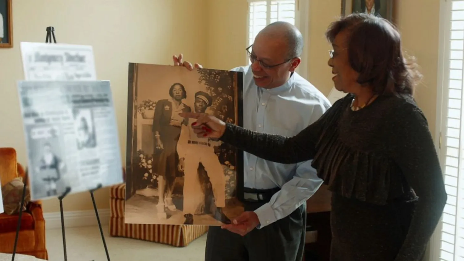 This image released by Sony Pictures Classics shows Jeffery Robinson and Josephine Bolling McCall, right, in a scene from "Who We Are." (Sony Pictures Classics via AP)