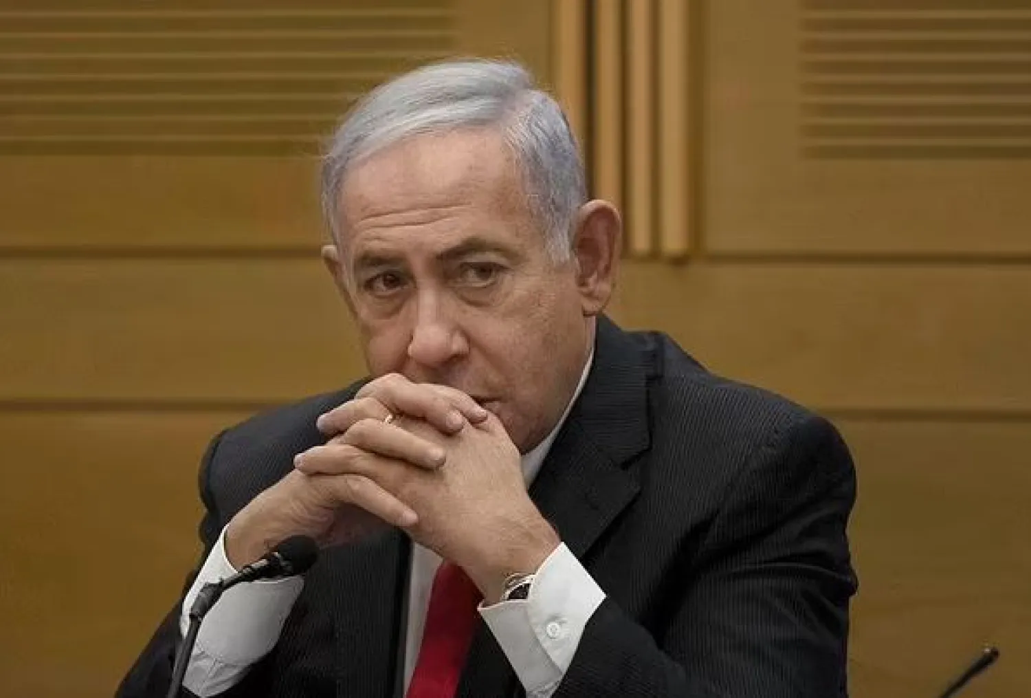FILE - Former Israeli Prime Minister Benjamin Netanyahu speaks to right-wing opposition party members, at the Knesset, Israel's parliament, in Jerusalem on June 14, 2021. (AP Photo/Maya Alleruzzo, File)

