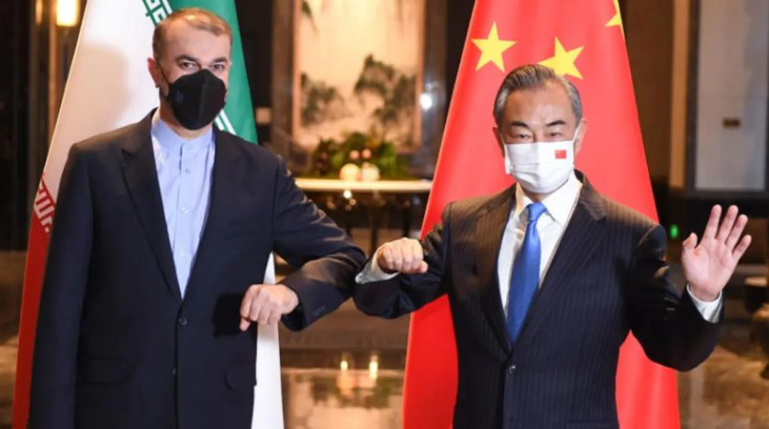 Chinese Foreign Minister Wang Yi and his Iranian counterpart Hossein Amirabdollahian (AP)
