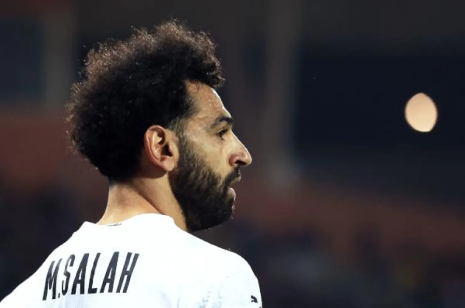 Egypt's forward Mohamed Salah reacts during the Group D Africa Cup of Nations (CAN) 2021 football match between Guinea-Bissau and Egypt at Stade Roumde Adjia in Garoua on January 15, 2022. (Photo by Daniel BELOUMOU OLOMO / AFP)