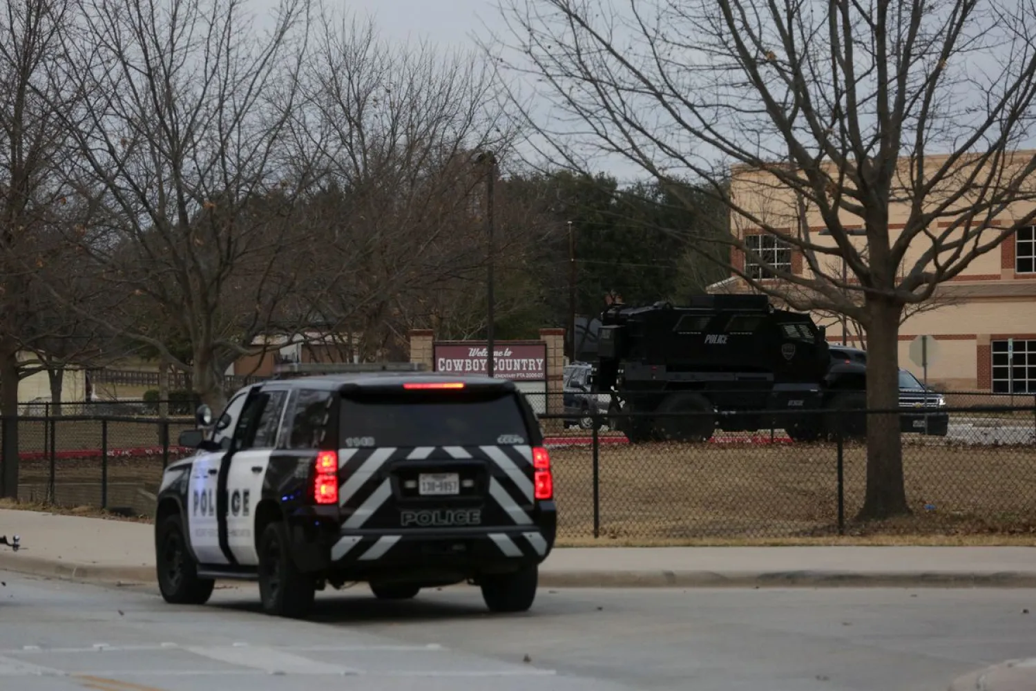 A law enforcement vehicle is seen in the area of the synagogue, in Colleyville, Texas, US January 15, 2022. REUTERS/Shelby Tauber