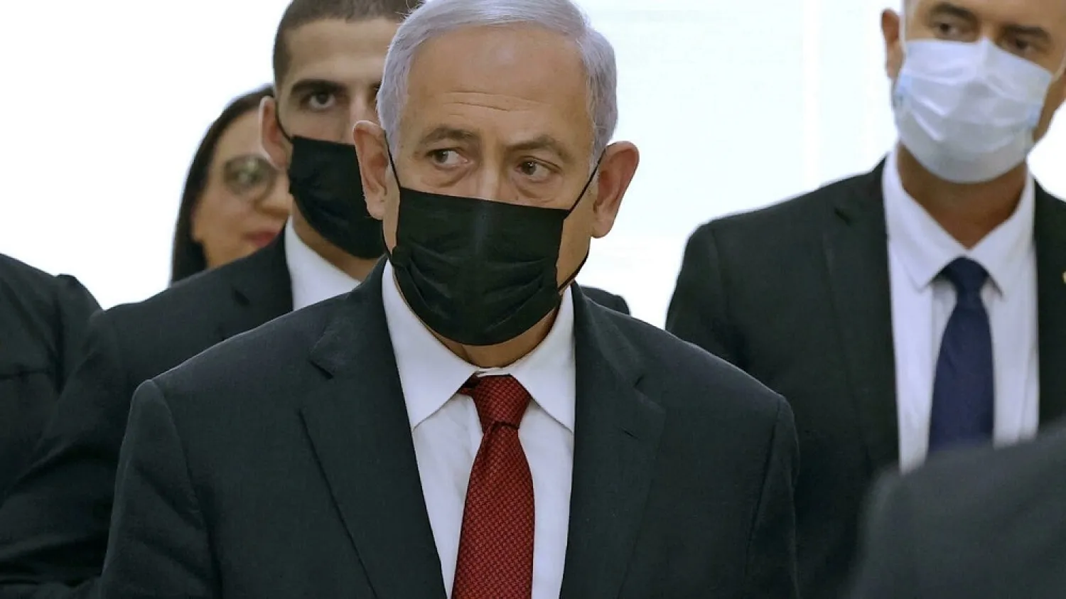 Former Israeli prime minister Benjamin Netanyahu leaves a Jerusalem court house on November 16, 2021. (AFP)
