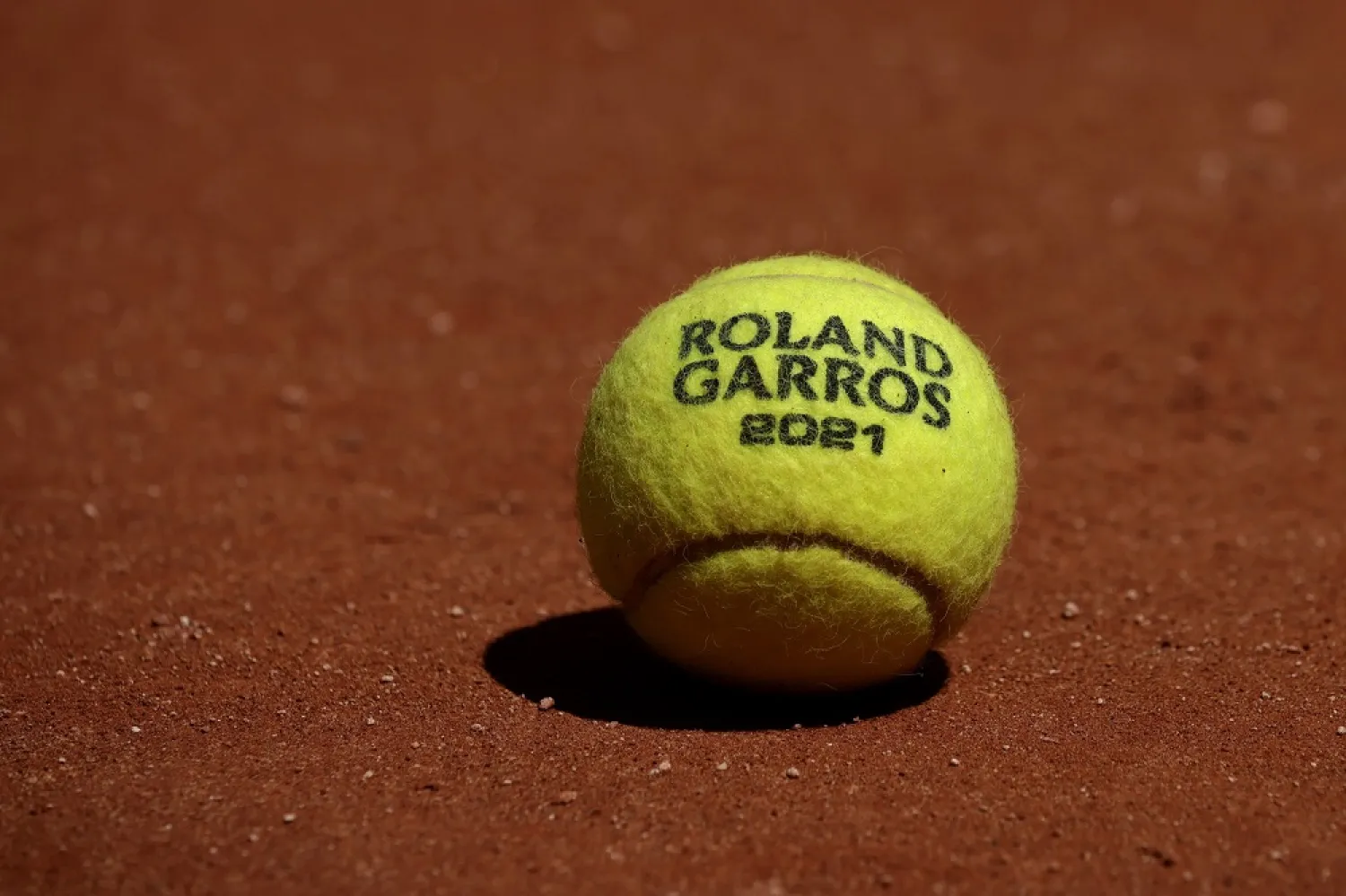 The official 2021 Roland Garros tennis ball during a practice session ahead of the French Open tennis tournament at Roland ​Garros in Paris, France, May 27, 2021. (EPA)