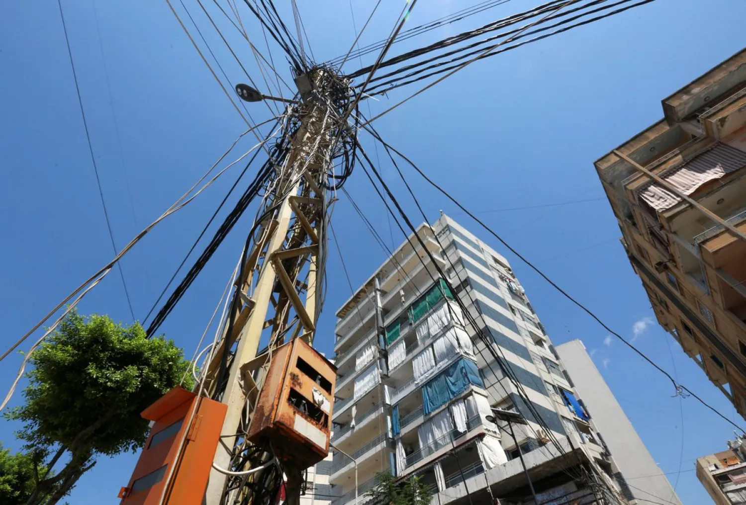 Electricity cables are seen in Tyre, Lebanon August 11, 2021. (Reuters) 