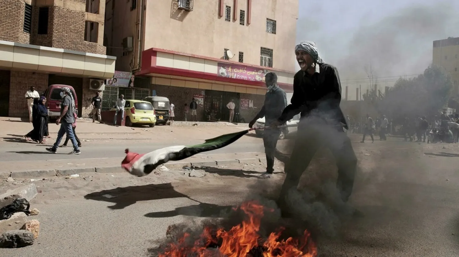  A man shouts during a protest in Khartoum, Sudan, on January 17, 2022. (AP)