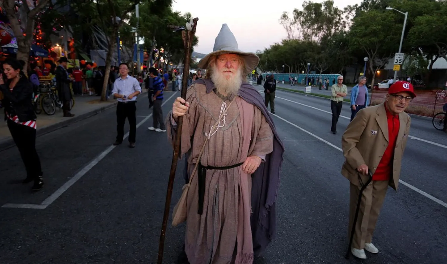 A man dressed as the character Gandalf the Grey from "Lord of the Rings" participates in the West Hollywood Halloween Costume Carnaval, which attracts nearly 500,000 people annually in West Hollywood, California October 31, 2013. (Reuters)