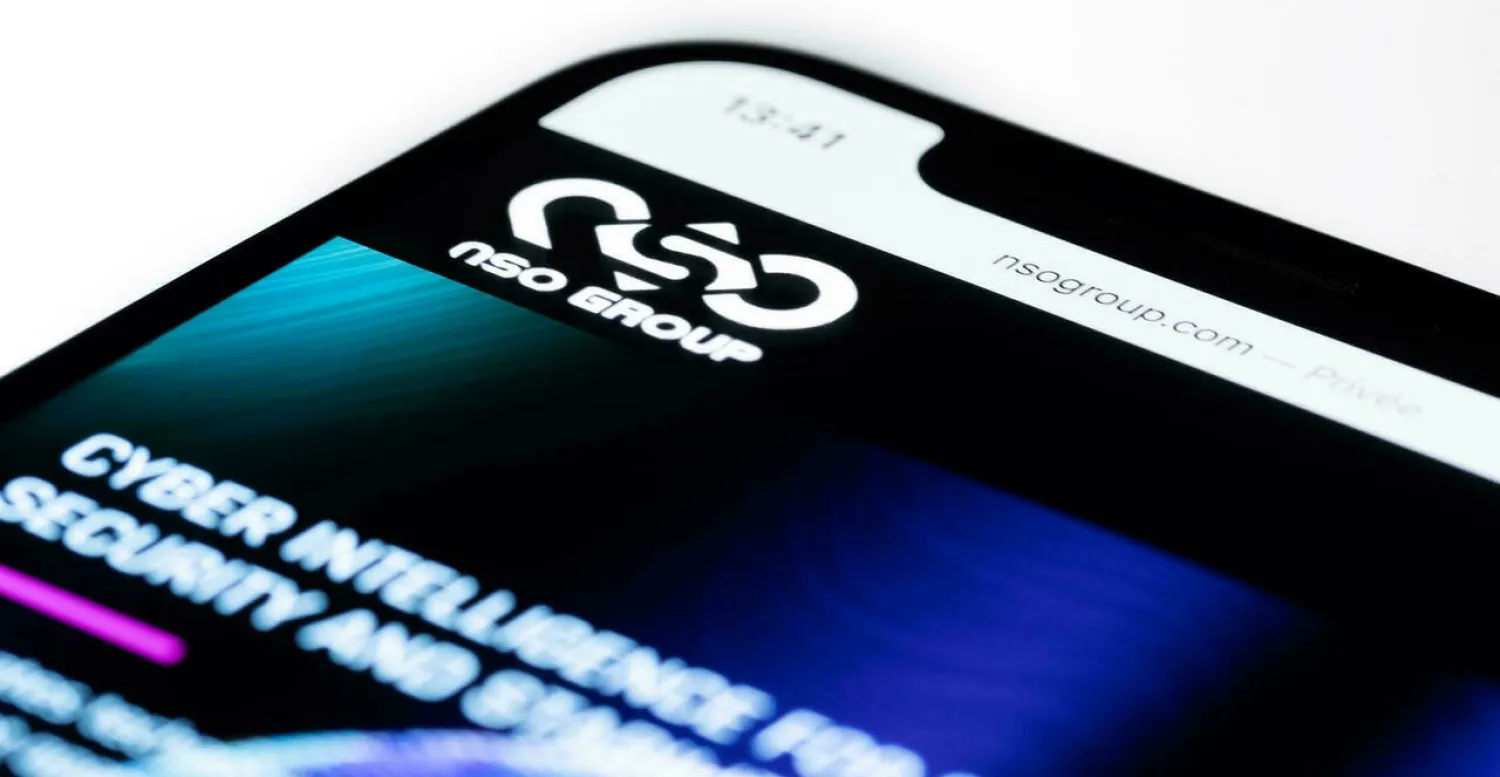 Smartphone shows the website of Israel's NSO Group which features "Pegasus" spyware. (AFP)