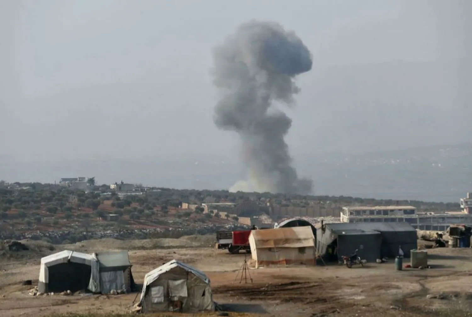 Air strikes still target Idlib region. Smoke billows from the Al-Arshani water station, reportedly hit by a Russian airstrike, on January 2, 2022 OMAR HAJ KADOUR AFP/File
