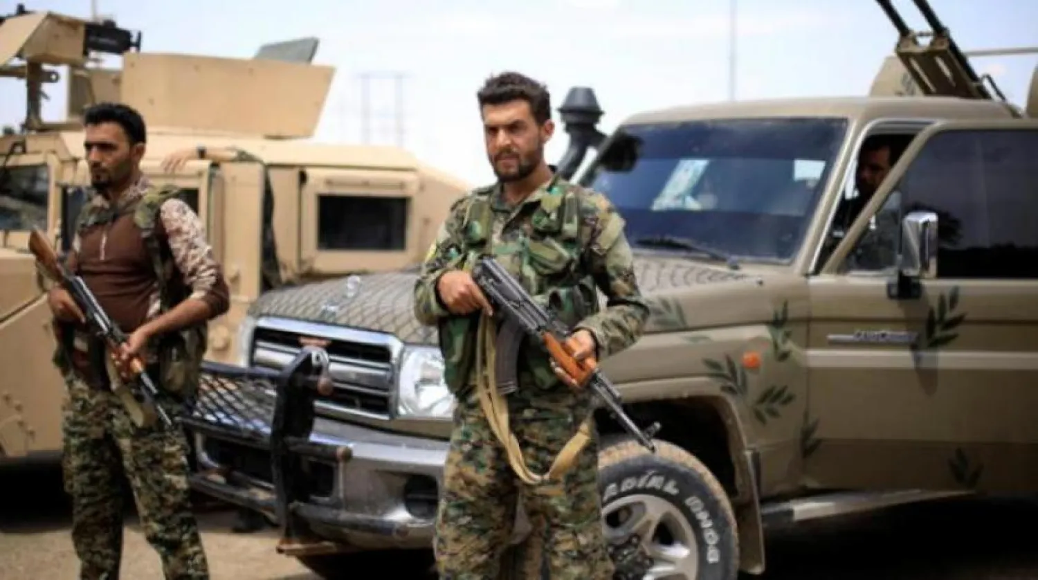 "Suriye Demokratik Güçleri"nden savaşçılar (Arşiv - Reuters)
