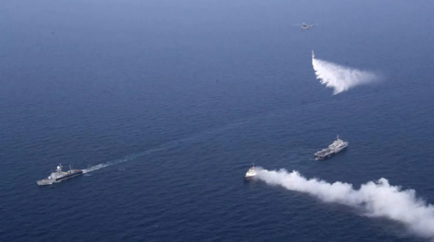 Rusya, Çin ve İran tarafından Hint Okyanusu'nda dün gerçekleştirilen ortak tatbikatlardan bir kare (EPA)