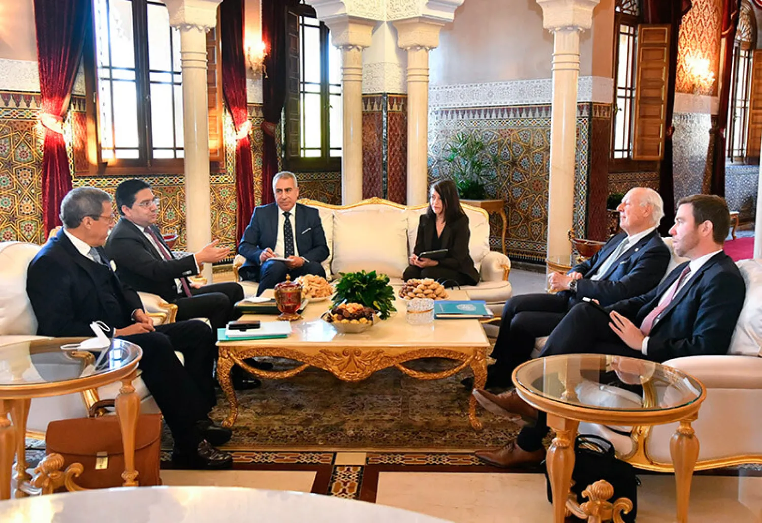 United Nations envoy Staffan De Mistura, second right, speaks with Nasser Bourita, Morocco's foreign minister, second left, and Omar Hilal, the country's ambassador to the UN, left, during a meeting in Rabat, Morocco, Thursday, Jan. 13, 2022. (AP)