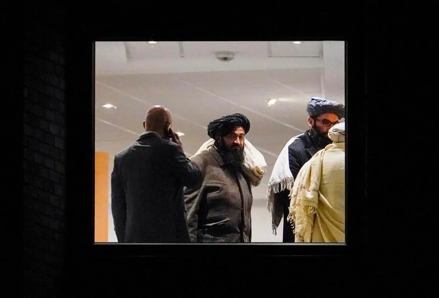A Taliban delegation is seen at the Soria Moria hotel in Oslo, Norway, Sunday, Jan. 23, 2022. (NTB scanpix via AP)