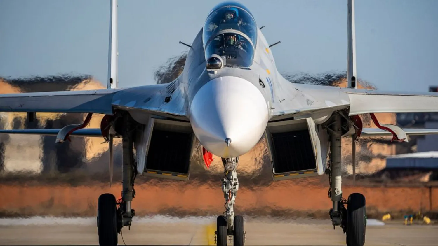 Main China pilots prepare to fly a J-16 fighter jet at a training base for China's People's Liberation Army (PLA) naval aviation force in Ningbo in eastern China's Zhejiang Province, Thursday, Jan. 14, 2021. (Chinatopix via AP, File)