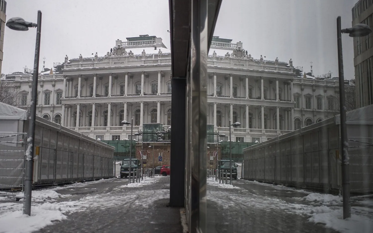 The Palais Coburg, where closed-door Iran nuclear talks take place, reflected in a window in Vienna, Austria, December 9, 2021. (AP)