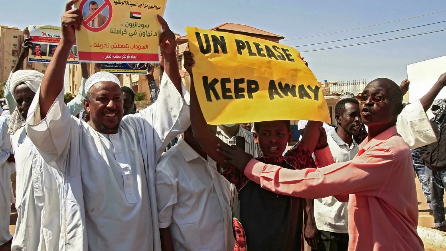 Sudanese pro-military protesters chant slogans as they demonstrate against a UN bid to resolve a political crisis. (AFP)