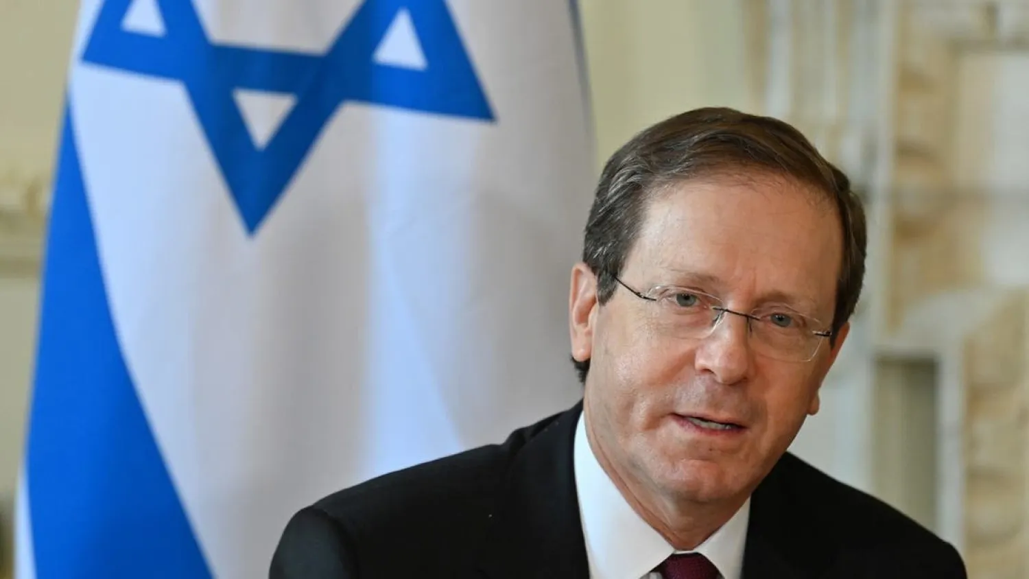 Israeli President Isaac Herzog meets with the British prime minister (not seen) inside Number 10 Downing Street in central London on November 23, 2021 during his three-day visit. (AFP)
