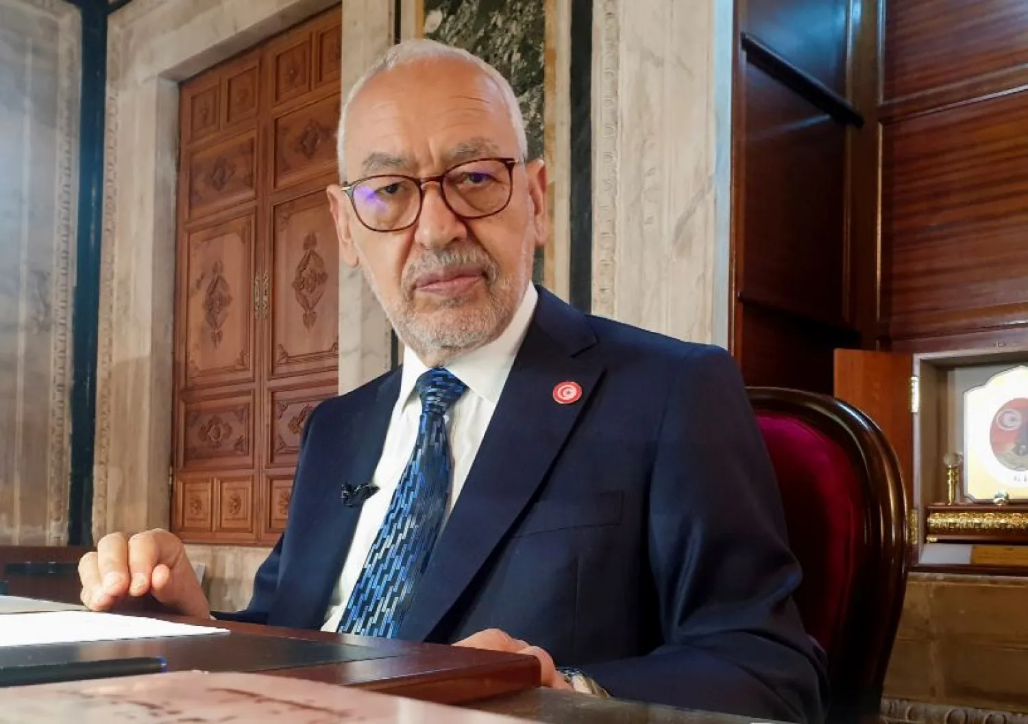 Parliament Speaker Rached Ghannouchi, head of the moderate Islamist Ennahda, poses during an interview with Reuters in his office, in Tunis, Tunisia, March 9, 2021. REUTERS/Jihed Abidellaoui/File Photo

