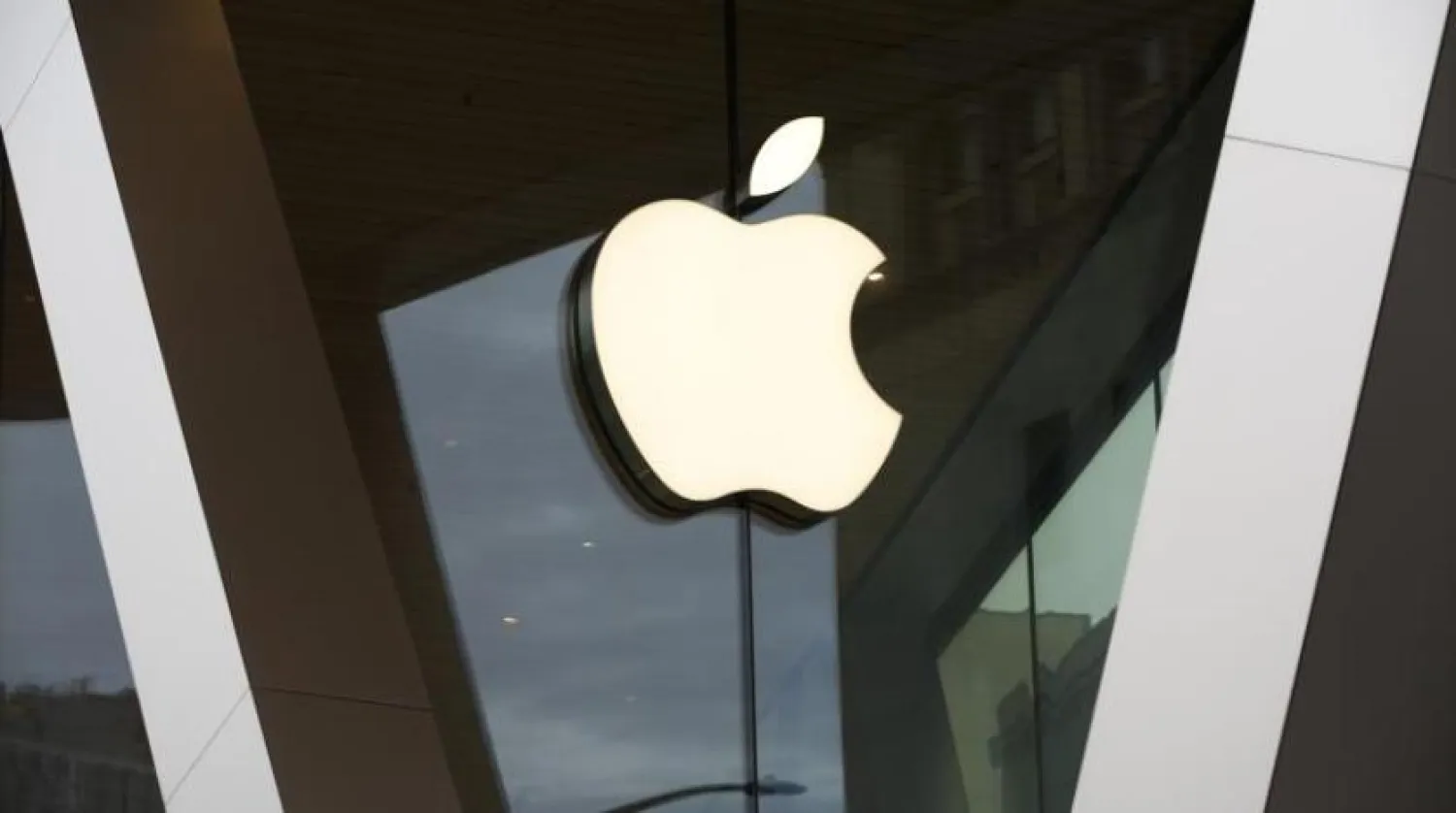 FILE - In this Saturday, March 14, 2020 file photo, an Apple logo adorns the façade of the downtown Brooklyn Apple store in New York. (AP Photo/Kathy Willens, File)
