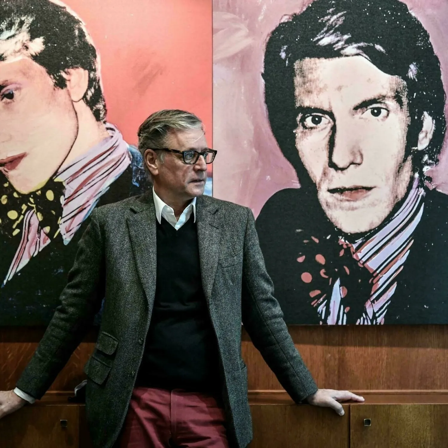 A portrait of the late designer with Madison Cox, president of the Yves Saint Laurent-Pierre Berger Foundation. STEPHANE DE SAKUTIN AFP
