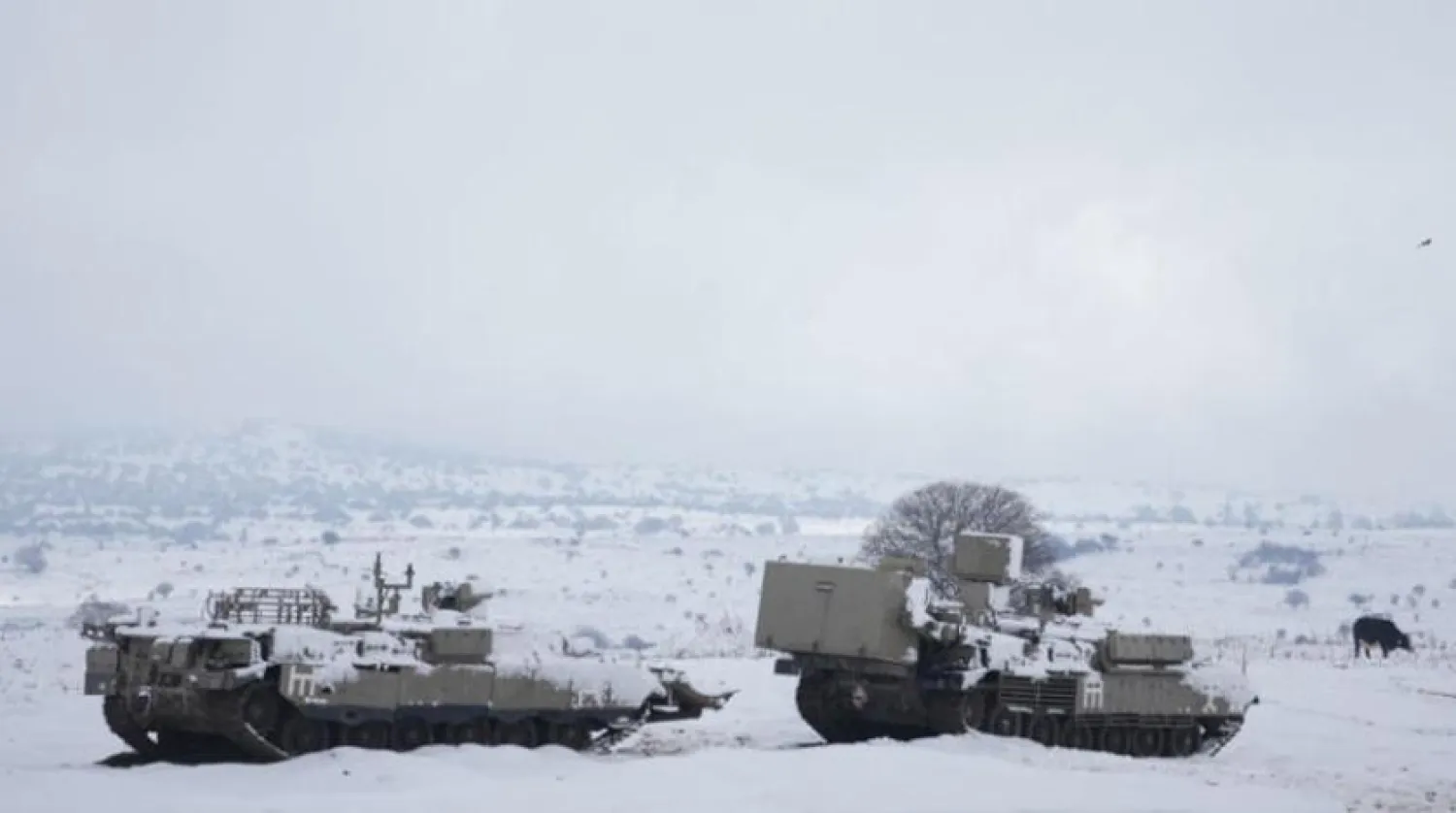 Israeli military vehicles are seen in the occupied Syrian Golan Heights on Thursday. (AP)