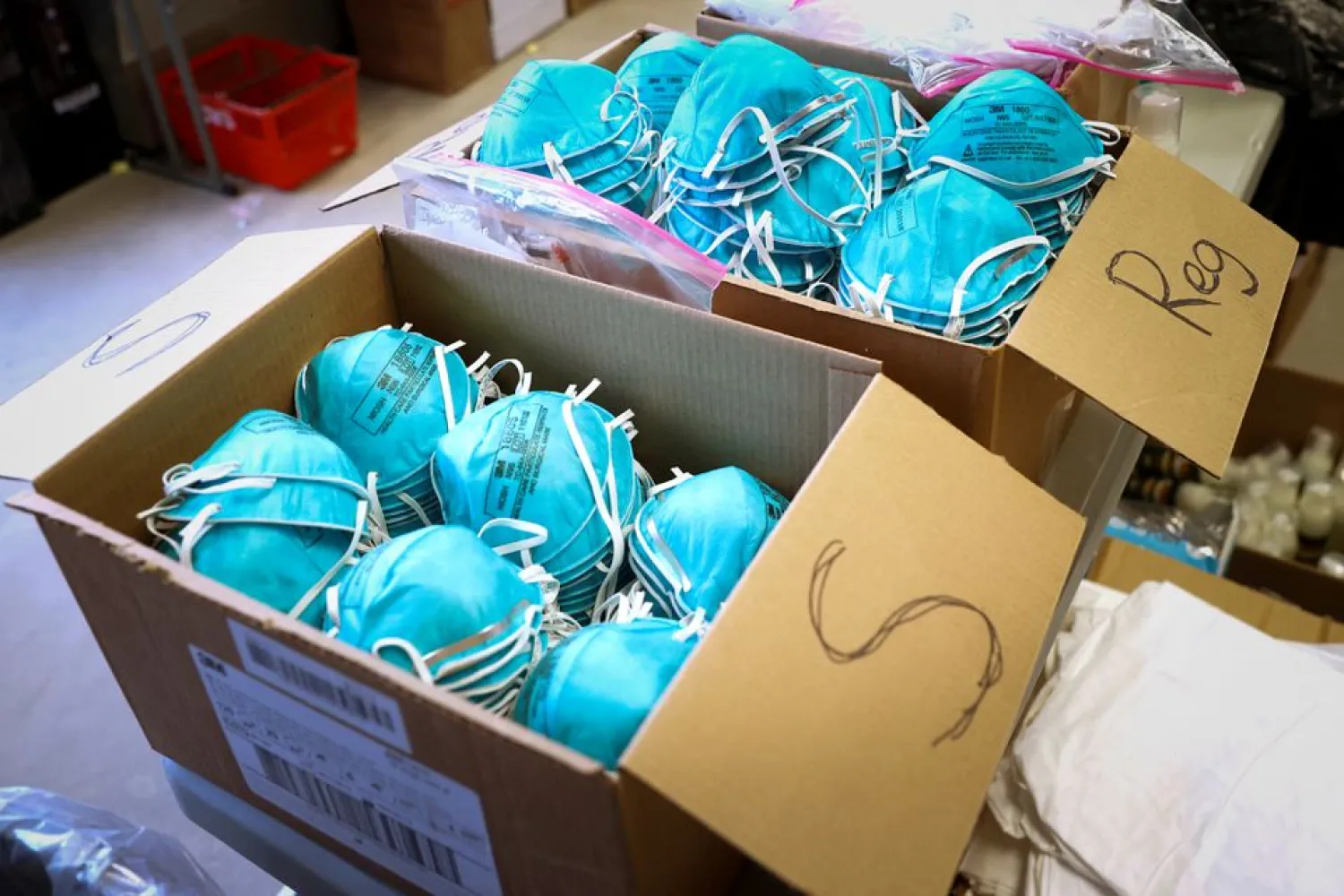 Boxes of N95 protective masks for use by medical field personnel are seen at a New York State emergency operations incident command center during the coronavirus outbreak in New Rochelle, New York, US, March 17, 2020. (Reuters)