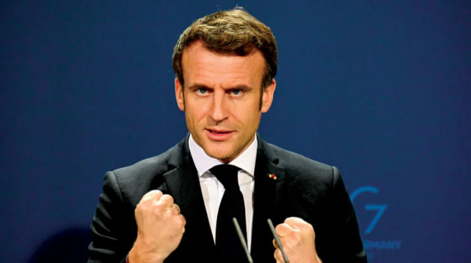 ماكرون خلال مؤتمر صحافي مع المستشار الألماني أولاف شولتس في برلين الأسبوع الماضي (أ.ب)