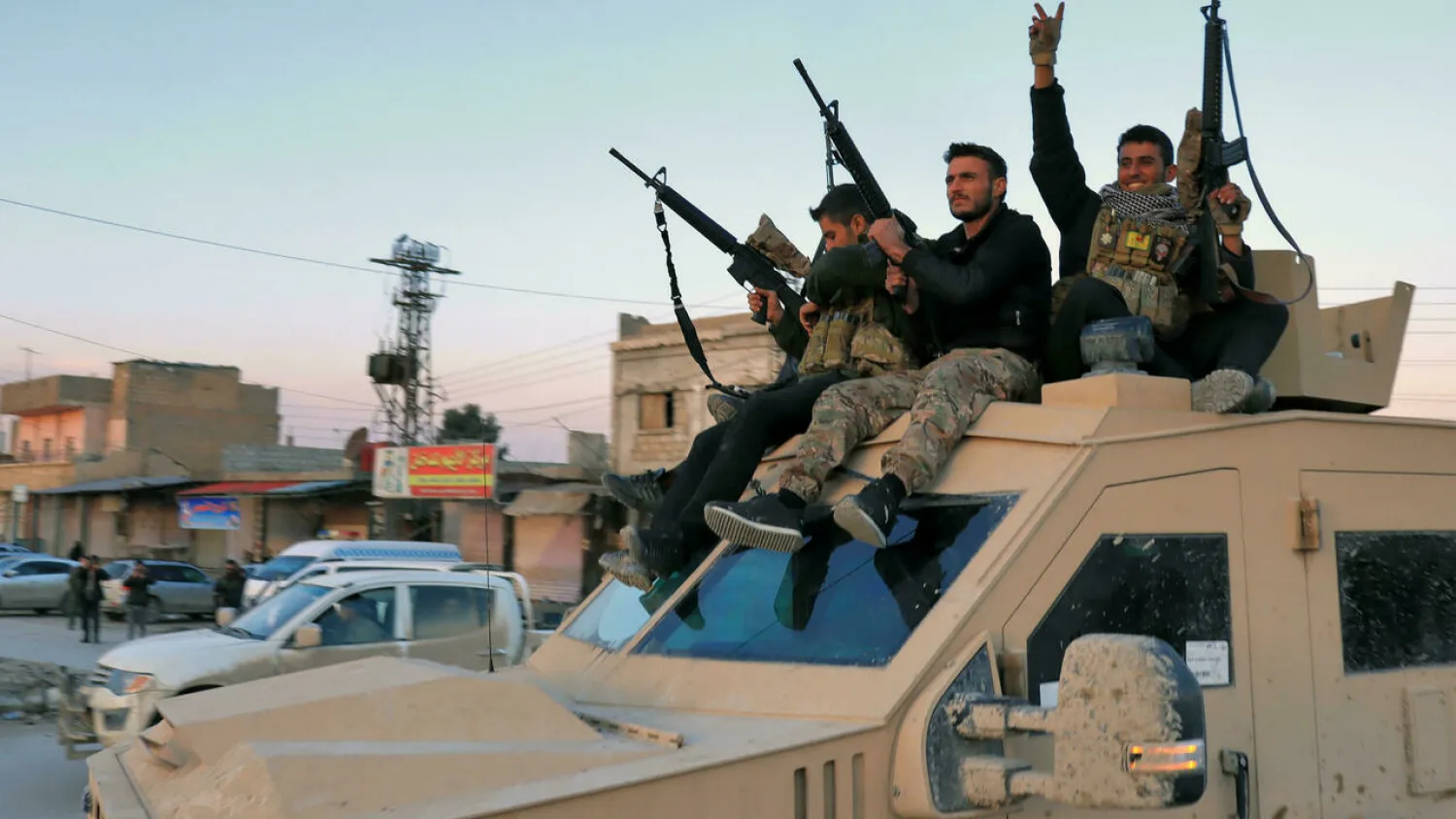 Members of the Syrian Democratic Forces (SDF) deploy outside Ghwayran prison in Syria's northeastern city of Hasakeh on January 26 - AFP
