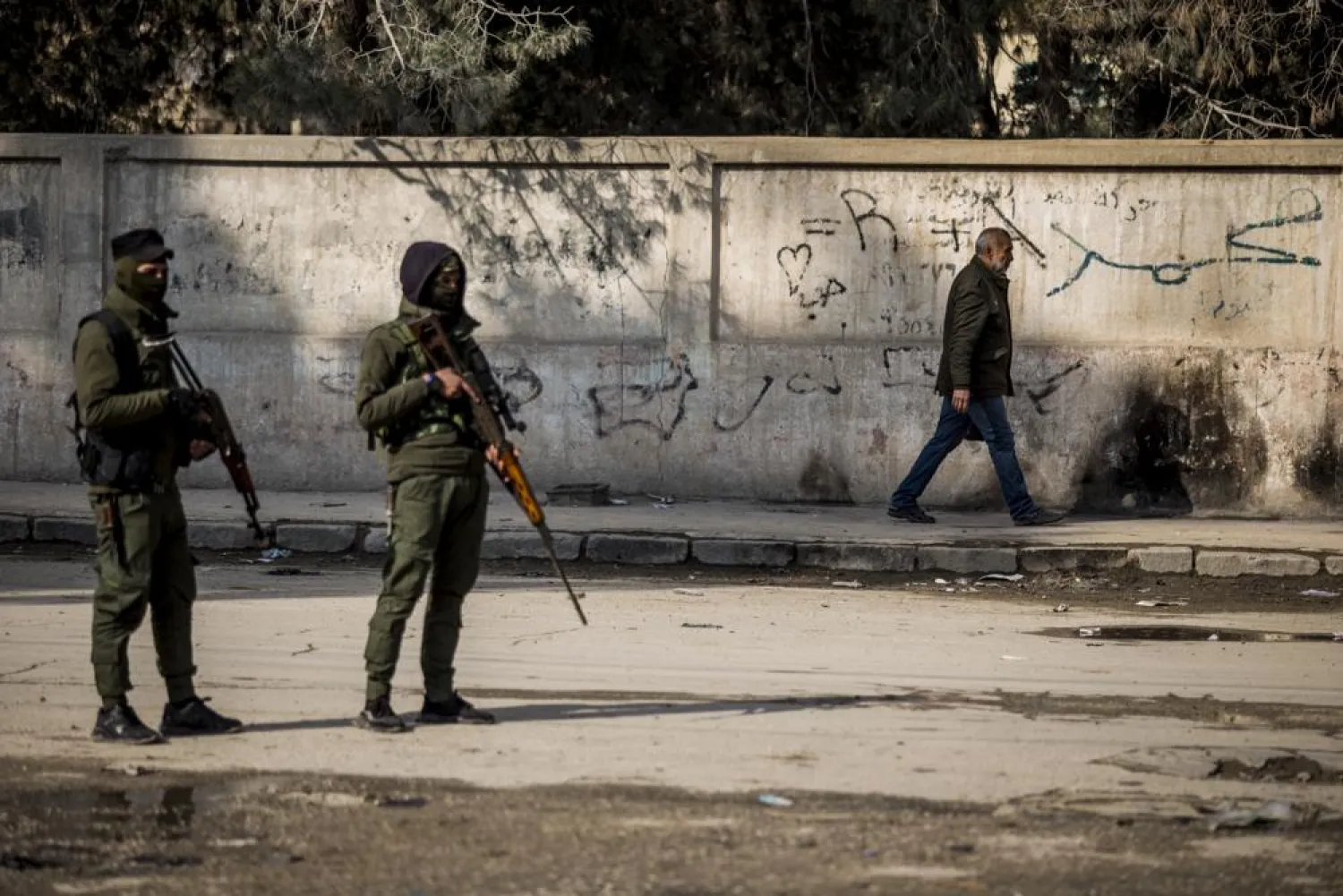 Civilians return to the city after fighting subsideds in Hassakeh, Syria, Sunday, Jan. 30, 2022. (AP Photo/Baderkhan Ahmad)
