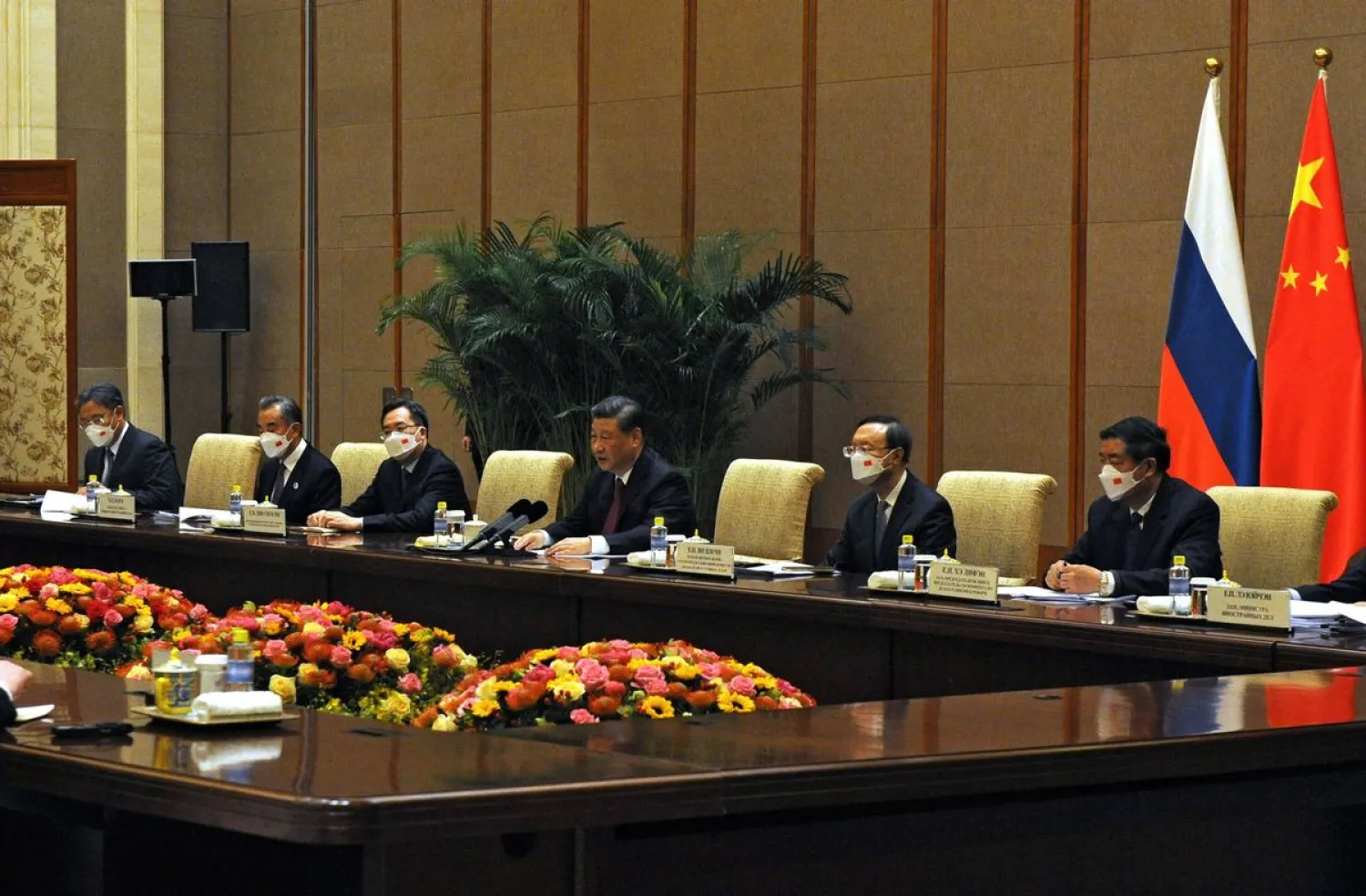 Members of the Chinese delegation led by President Xi Jinping attend a meeting with Russian President Vladimir Putin and other officials in Beijing, China February 4, 2022. (Reuters)