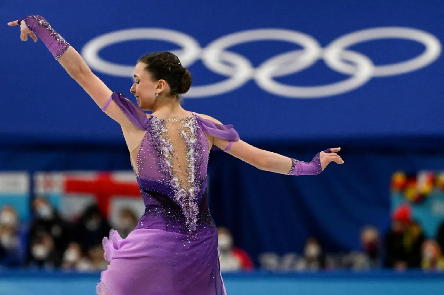 Kamila Valieva delivered a flawless short program to put the Russian Olympic Committee (ROC) in the driving seat in the figure skating team event. (AFP)