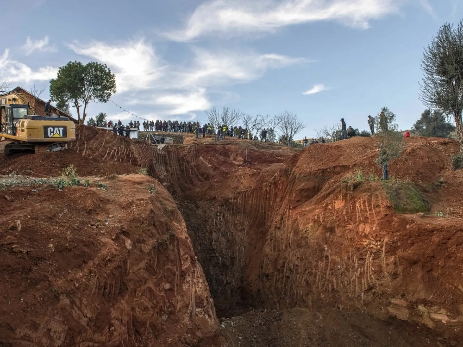 The boy had been stuck in the well, located in the northern village of Ighran in Morocco's Chefchaouen province, since falling into it Tuesday. (AP