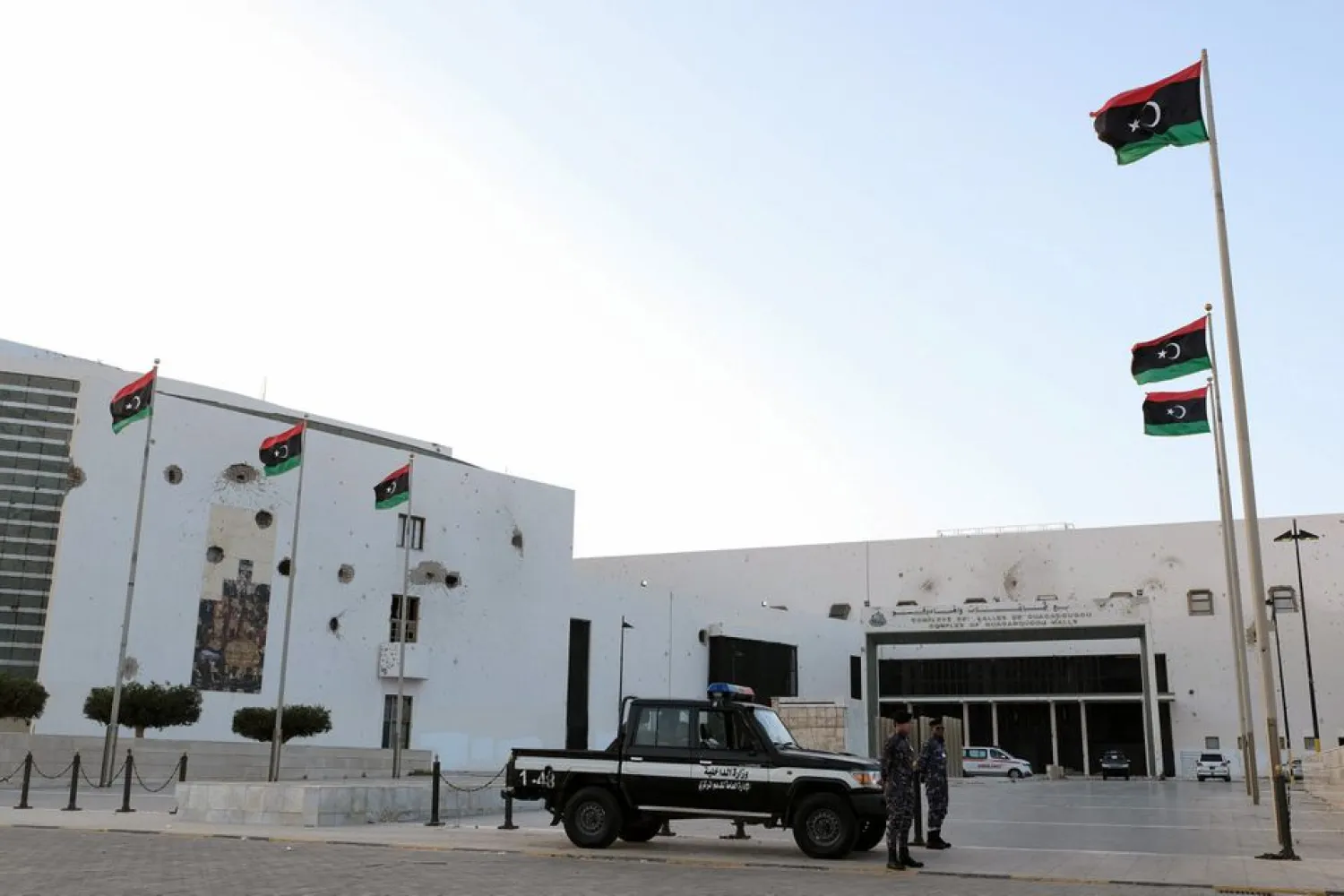 Security forces stand guard outside the Parliament building, in Sirte, Libya March 7, 2021. Picture taken March 7, 2021. (Reuters)