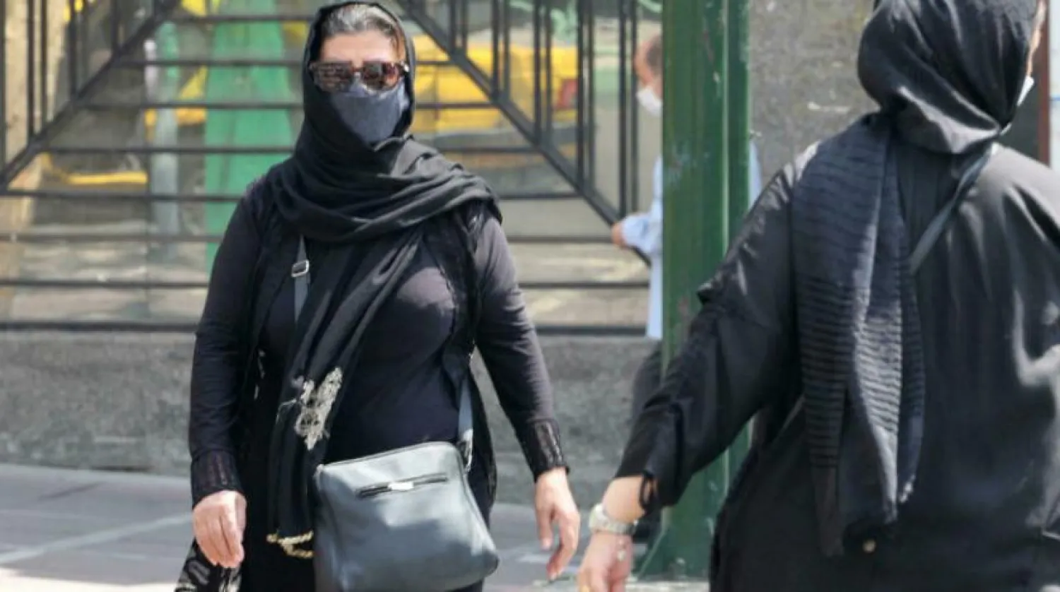 Birçok İranlı, yetkilileri kadınları aile içi şiddetten koruyan yasada reform yapmaya çağırıyor (Arşiv - AFP)
