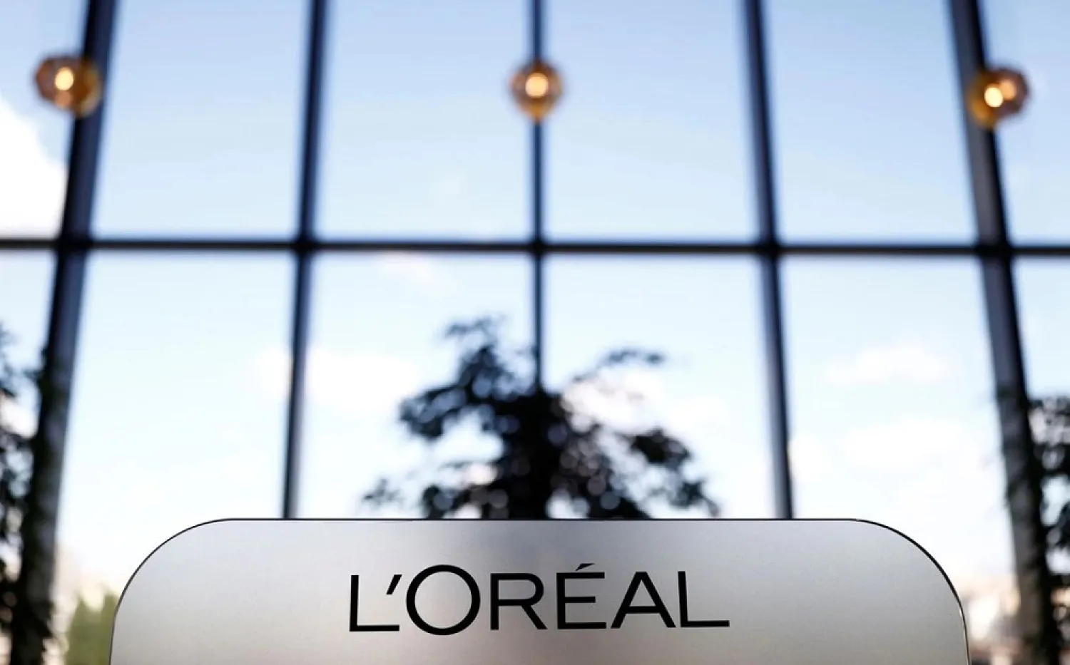 A L'Oreal logo is seen at the company's offices in Levallois-Perret, near Paris, France, May 7, 2021. (Reuters)