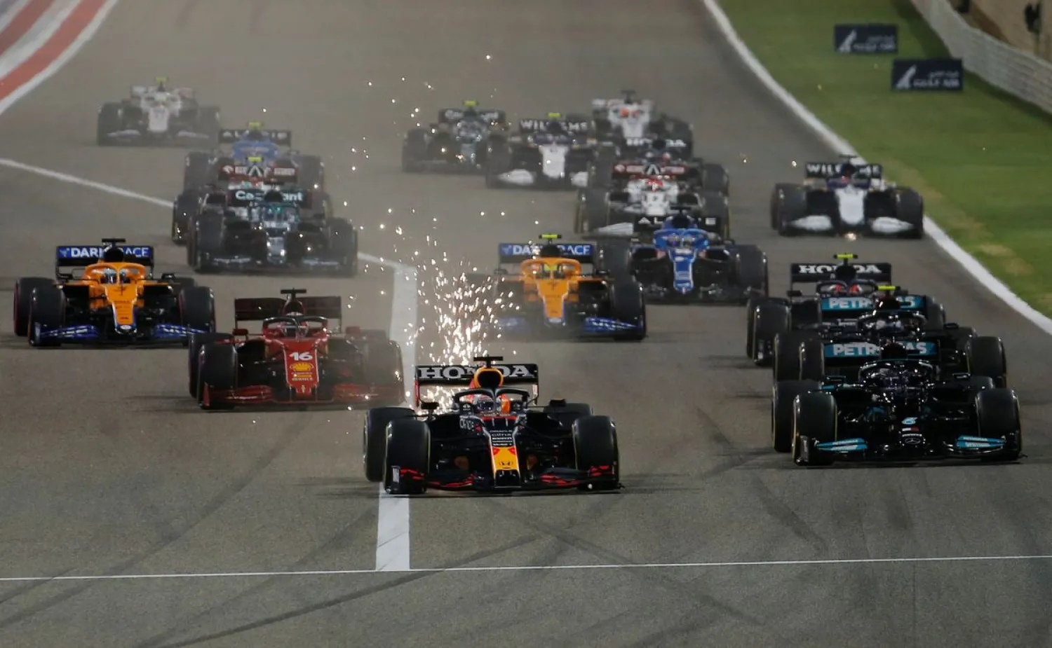 Formula One F1 - Bahrain Grand Prix - Bahrain International Circuit, Sakhir, Bahrain - March 28, 2021 Red Bull's Max Verstappen leads at the start of the race. (Reuters)